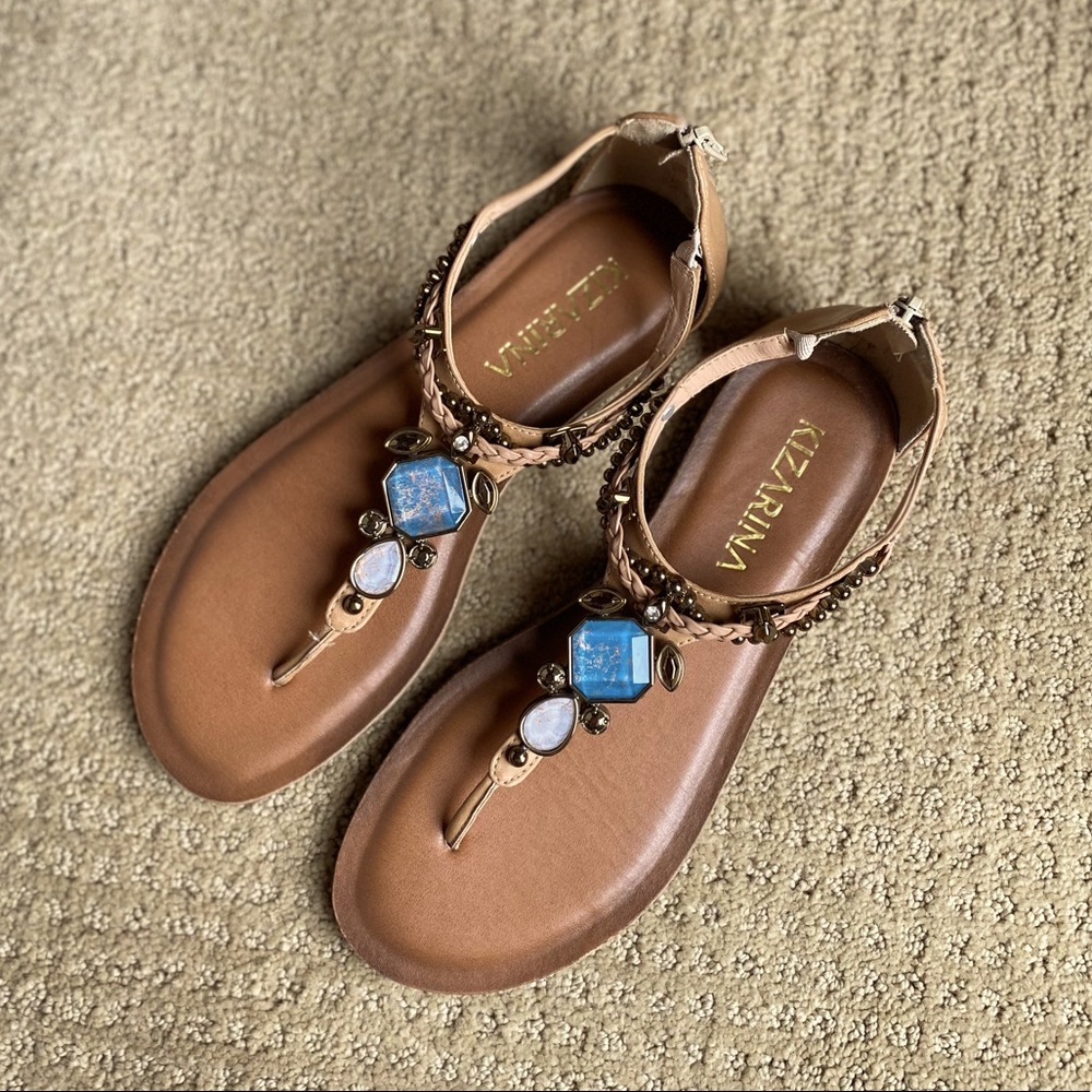 Tan flat with stones detail